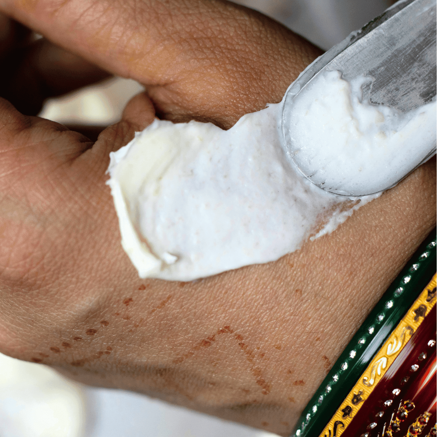 Body butter on hand