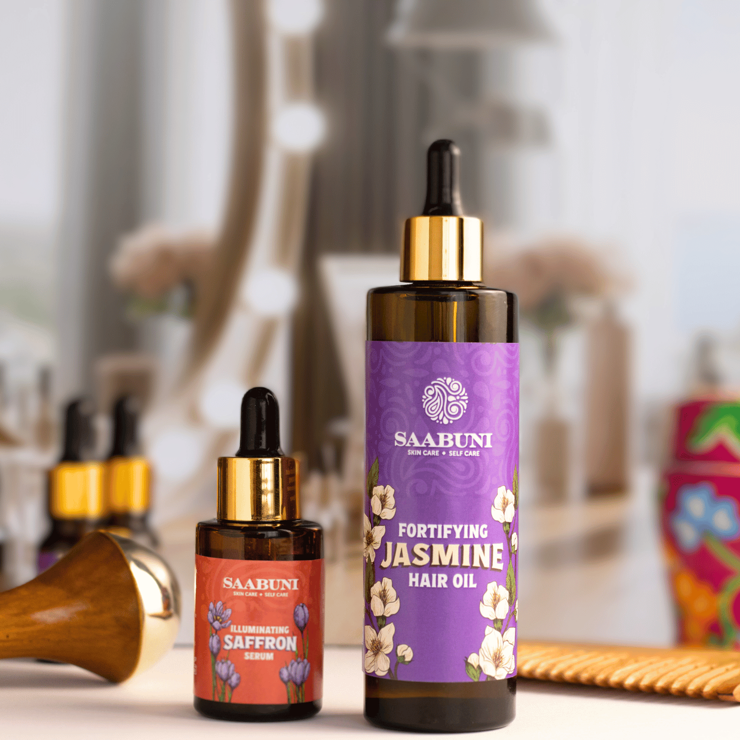 Hair oil and face serum on a dressing table