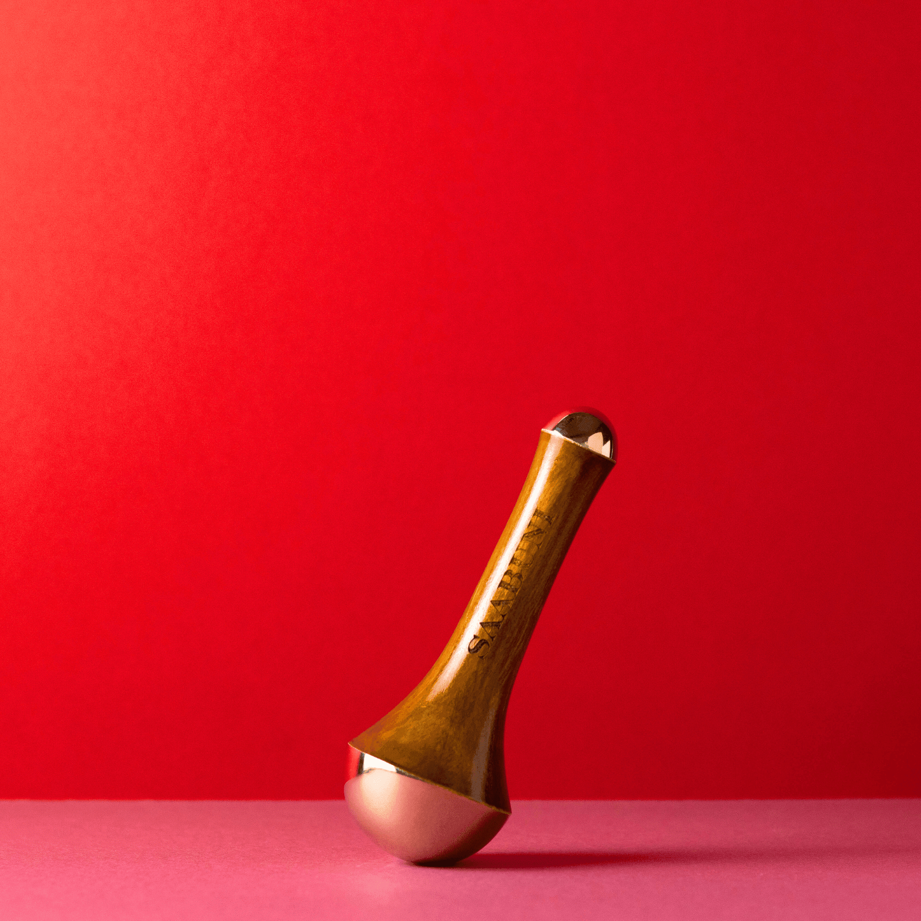 Dual Tipped Kansa Wand Red background