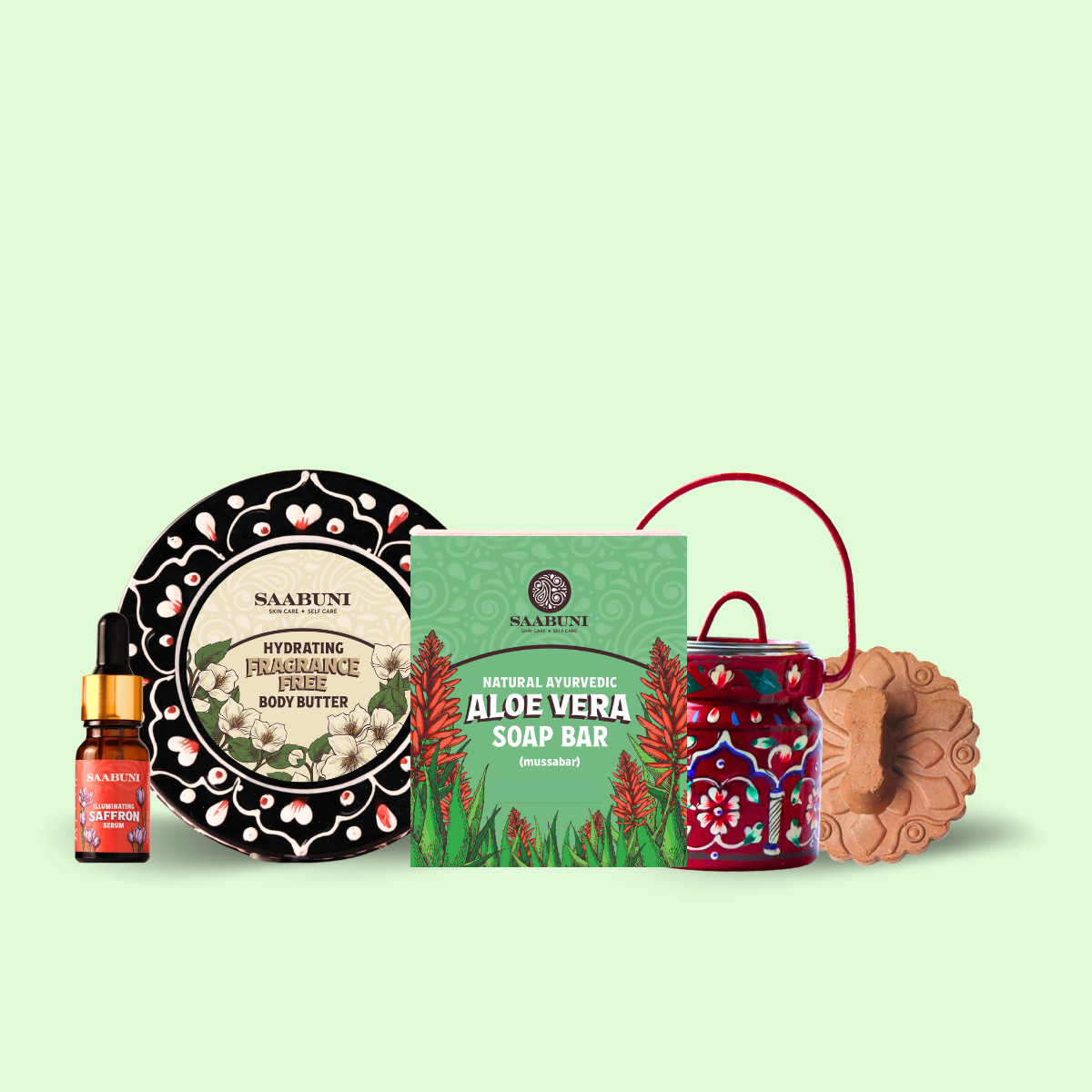 Collection of Saabuni skincare and wellness products on a light green background