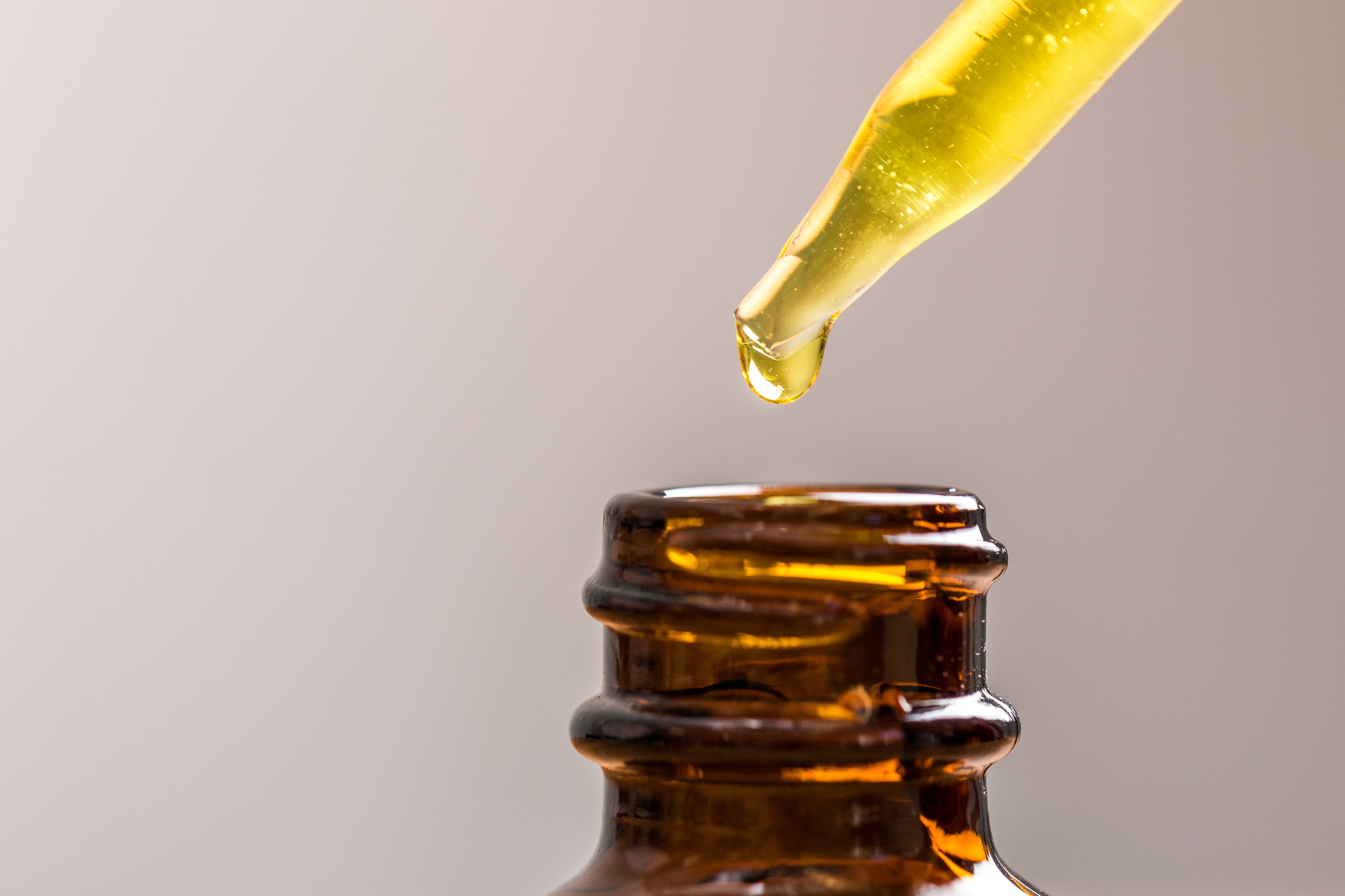 oil dropper into bottle