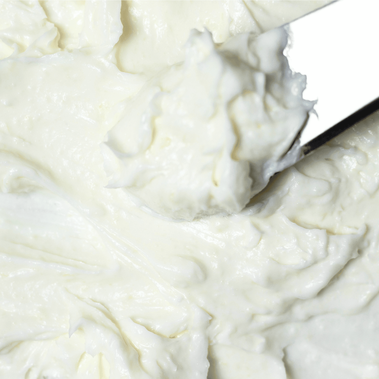 body butter cream with knife