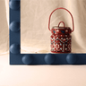 red bath milk in blue frame