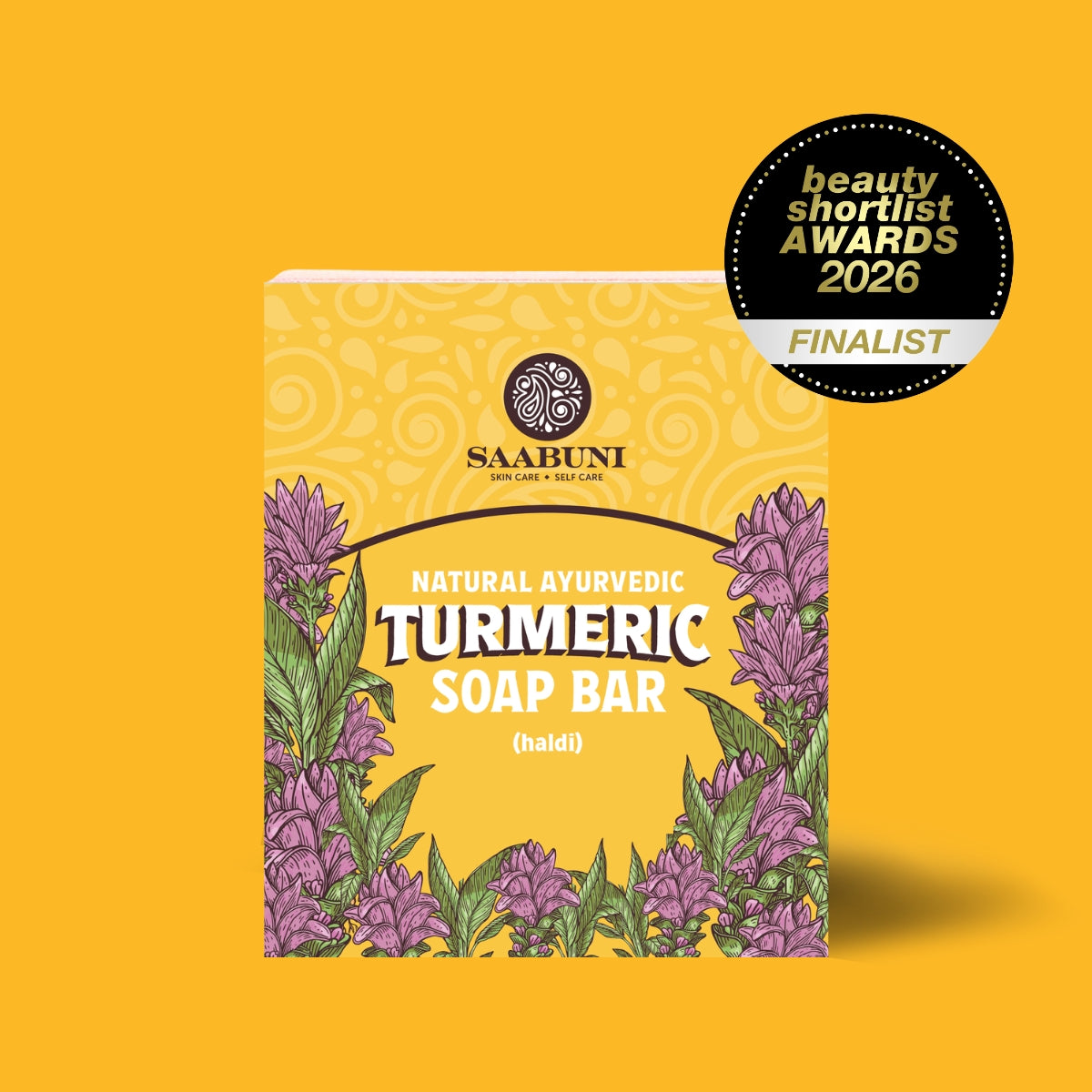 Saabuni Turmeric Soap Bar packaging with purple flowers on a yellow background, featuring an award badge.
